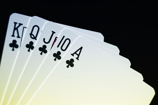 Royal Flush cards against black background