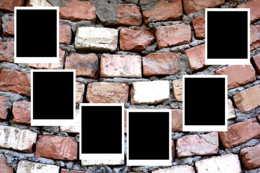 set of six old blank polaroids frames lying on a brick surface 