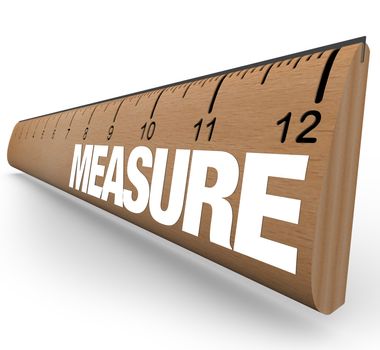 A wooden ruler with the word Measure, illustrating the need to do measurements to quantify objects or processes