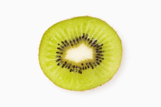 A sliced of kiwi fruit on white background