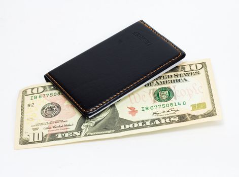 10 dollar bill US currency in an  purse. 