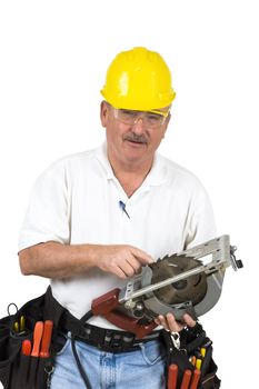 Carpenter checking teeth on saw over a white backgeround