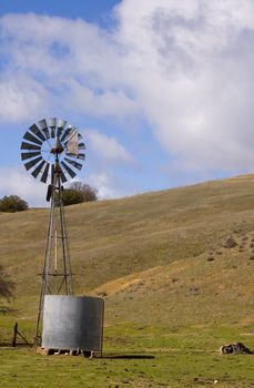 Alternate energy - Wind powered pump with water tank