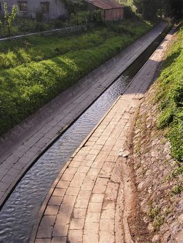 Water canal with concrete banks.