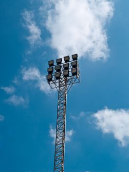 football stadium floodlight that  against blue sky