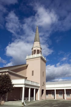 Small town church with steeple and belfry