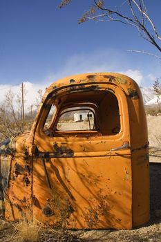 Urban grunge : cab of old pickup abandoned in the desert behind an old hotel in death valley