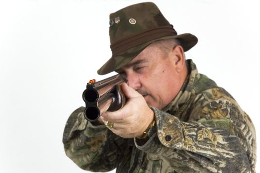 shotgun shooter taking aim over a white background