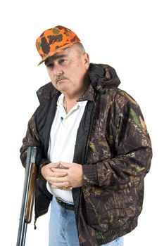 shotgun shooter with orange hat, shotgun and camo jacket over a white background