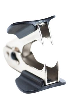 Close-up view of staple remover isolated over white background