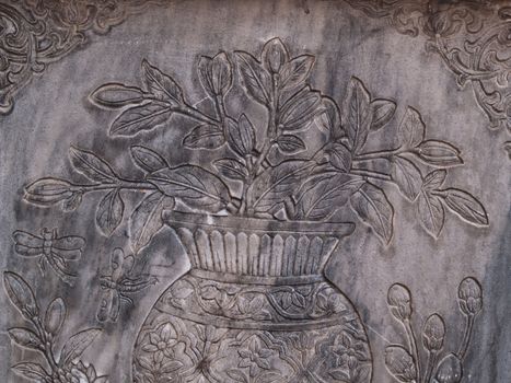 ancient flower engrave on wall