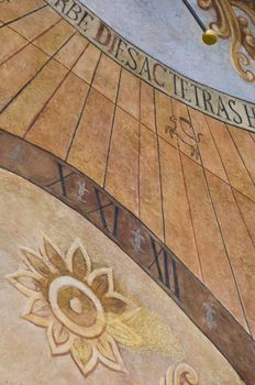 detail of a beautiful old sun dial in Prague