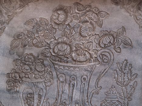 ancient flower engrave on wall