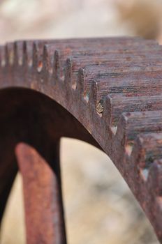 a rusty old gear as an abstract background blur