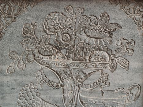 ancient flower engrave on wall