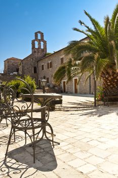 View on old table and alley in Budva, Monatenegro.