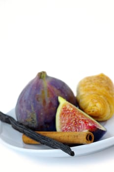 Fresh figs and spice on white background
