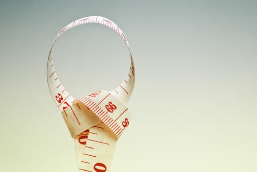 Studio shot of measuring tape against white background