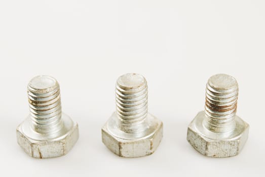 Rusted bolt against white background