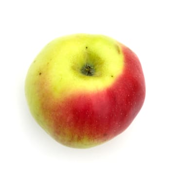 Ripe red apple on a white background. A close up.