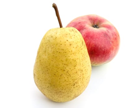 Yellow pear and red apple on a white background.