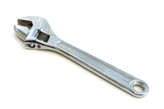 Adjustable spanner on a white background. Close up.