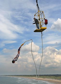 Bungy jumping above the Dutch coast