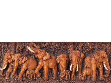 elephants engrave on wood