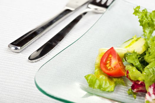 mixed salad on a glass plate