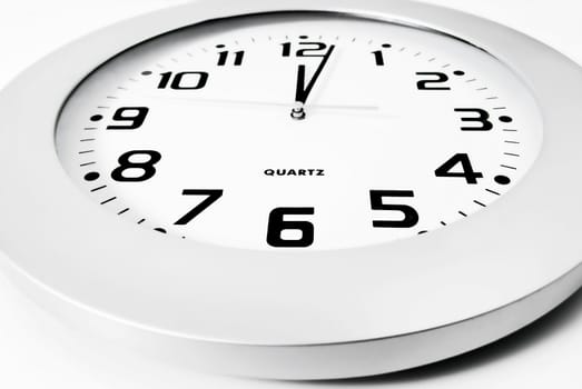 Close-up of wall clock against white background