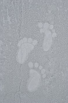 photo of the human footsteps on rime