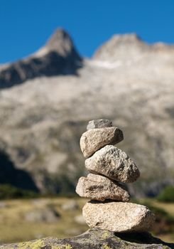 Pile of stones indicating a trail in the mountains