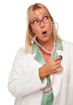 Attractive Female Doctor or Nurse Checking Her Own Heart Isolated on a White Background.