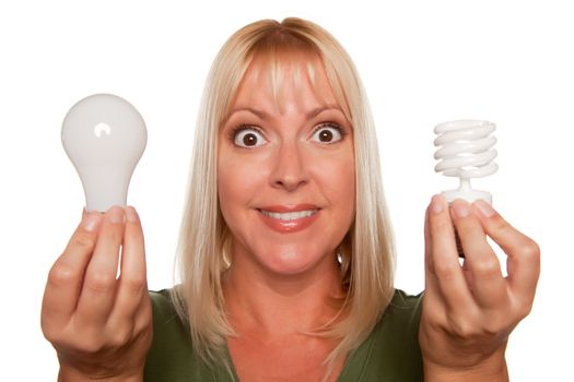 Woman Holds Energy Saving and Regular Light Bulbs Isolated on a White Background.