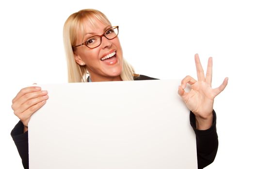 Attractive Blonde with Okay Hand Gesture Holding Blank White Sign Isolated on a White Background.