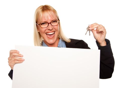 Attractive Blonde Holding Keys and Blank White Sign Isolated on a White Background.