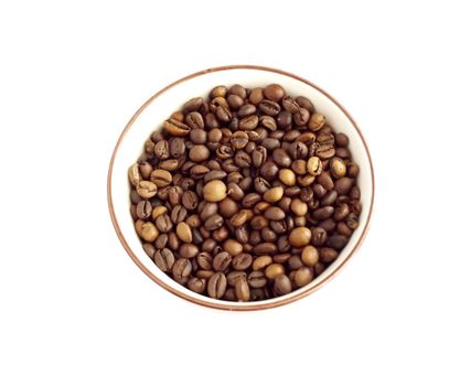 An isolated cup full of coffee beans, white background