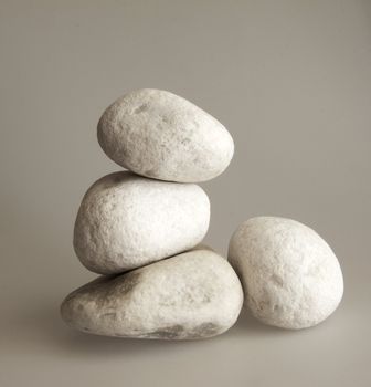 Four pebbles in a pile