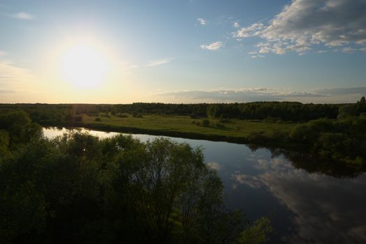 photo of the beautiful evening landscape with river