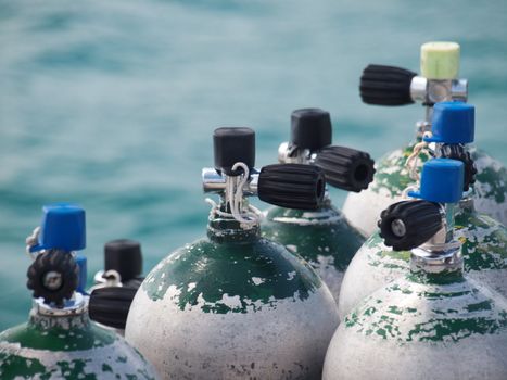 Oxygen bottles lined up ready to be used for a PADI  course