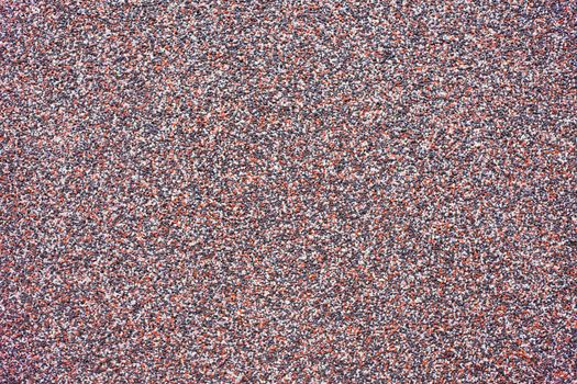 Colorful gritstone background texture pattern.