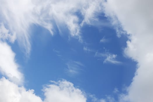 Window in sky. Beautiful cloudscape, warm summer day