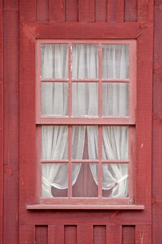 Old window with white courtains. Aveiro, Portugal.