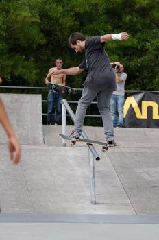 ILHAVO, PORTUGAL - AUGUST 13: Rafael Pinto on a frontside boardslide during the Skate Open Ilhavo on August 13, 2011 in Ílhavo, Portugal.