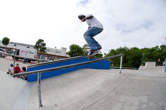 ILHAVO, PORTUGAL - AUGUST 13: Ivan Vicente on a croocked grind during the Skate Open Ilhavo on August 13, 2011 in Ílhavo, Portugal.