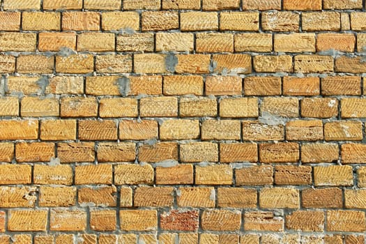 Fragment of wall with light cute limestone blocks