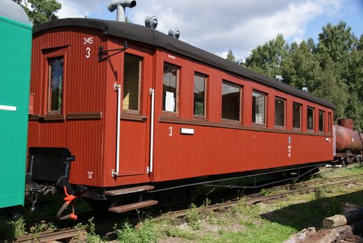 The old carriage from narrow-gauge road