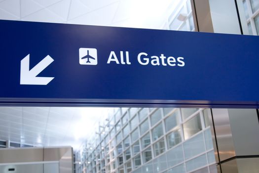 Direction signs in an airport terminal for travelers