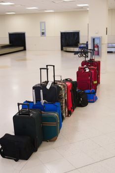 Passenger baggage and luggage in the baggage claim area of the airport