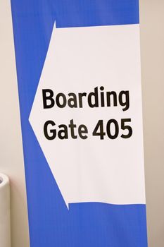 Direction signs in an airport terminal for travelers